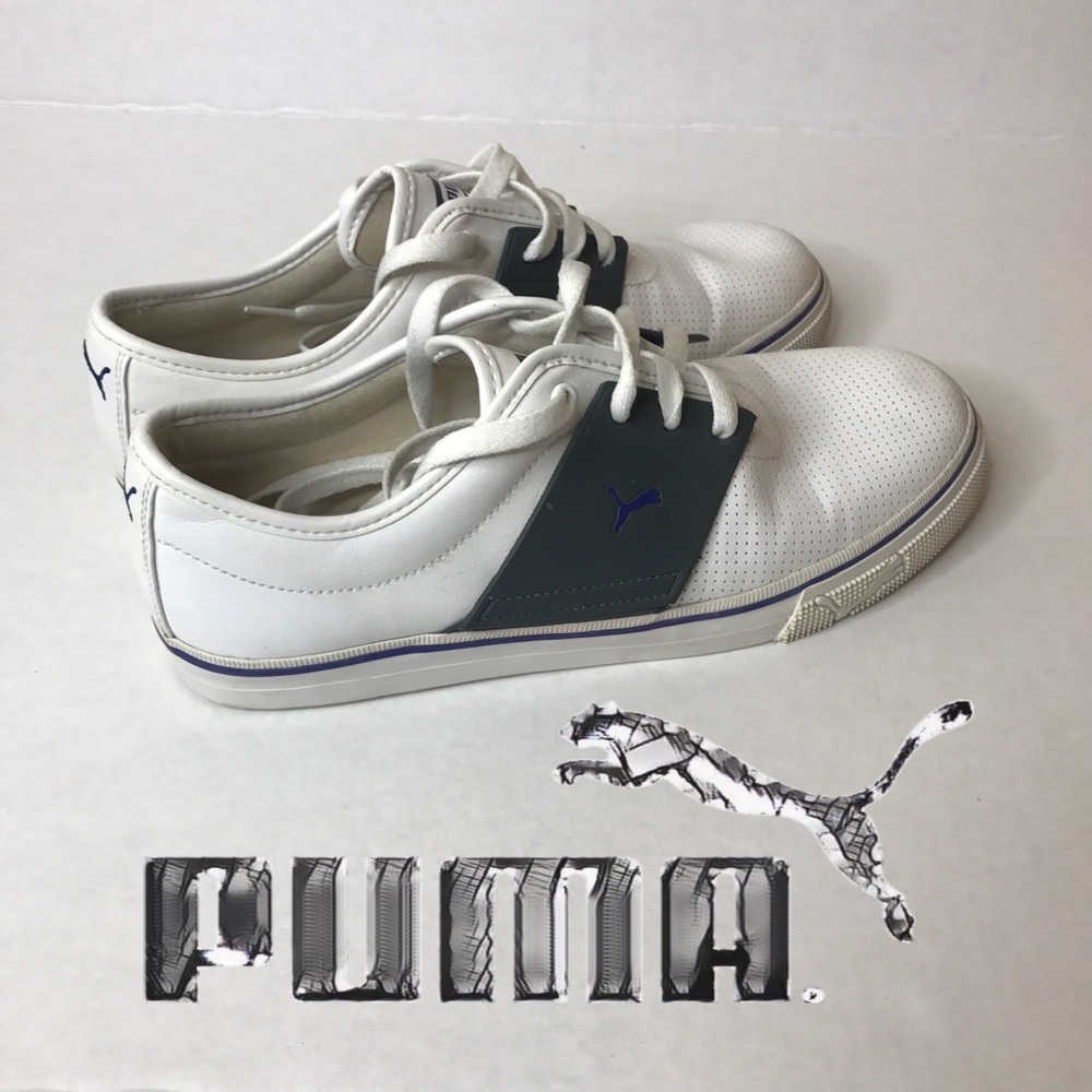 Puma men's shoes size 10 withe color sneakers